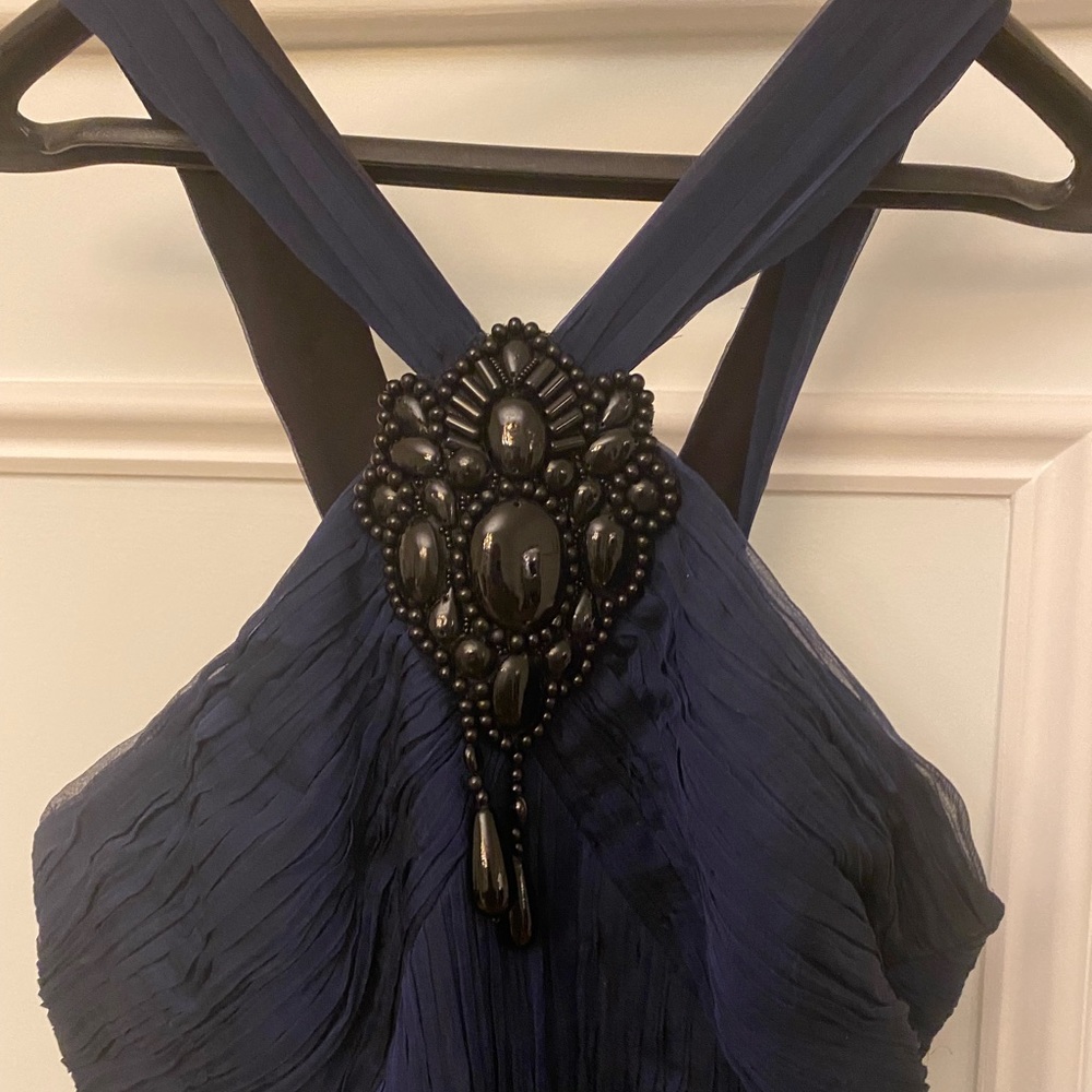 navy prom dress. andrew gn. missing tassle